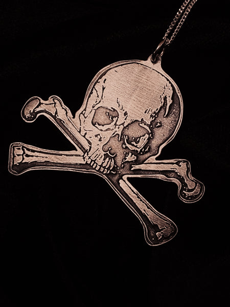 Skull and crossbones pewter pendant on sterling silver chain