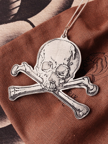 Skull and crossbones pewter pendant on sterling silver chain
